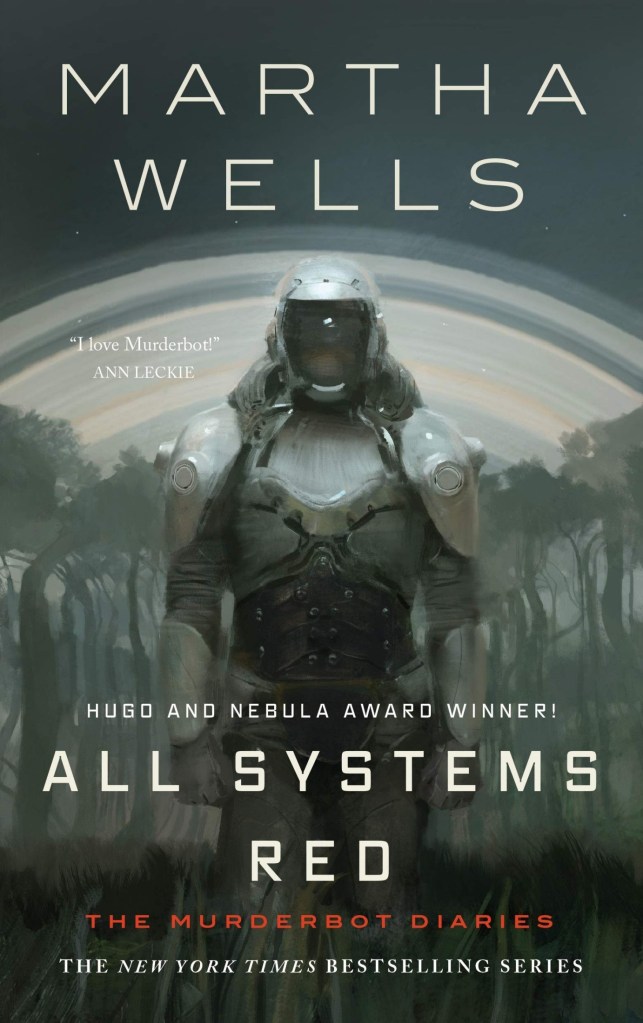 Book cover for 'All Systems Red' by Martha Wells. Image is a figure wearing futuristic arm and a helmet with an opaque face plate. Trees loom in the background and a multicolored arc spans behind the trees